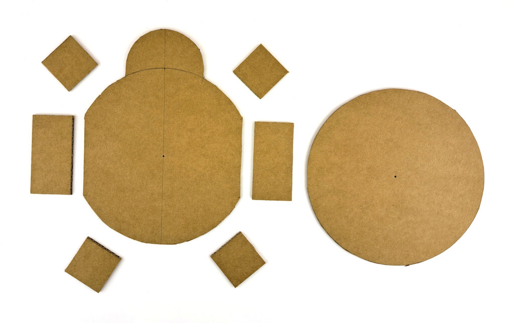 Ausgeschnittene Pappteile für das Roboter-Chassis